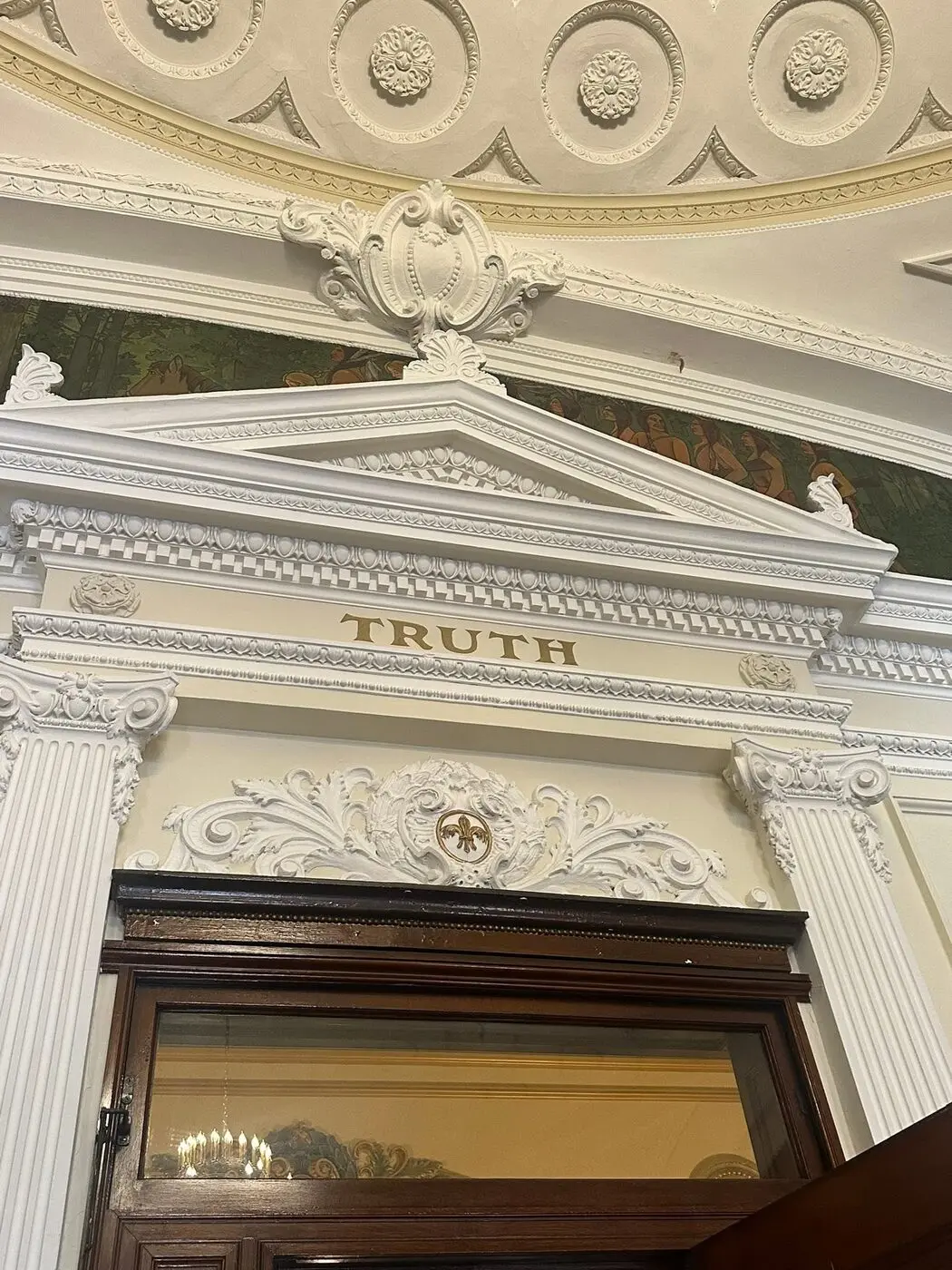 Courthouse architectural detail with the word Truth above a doorway