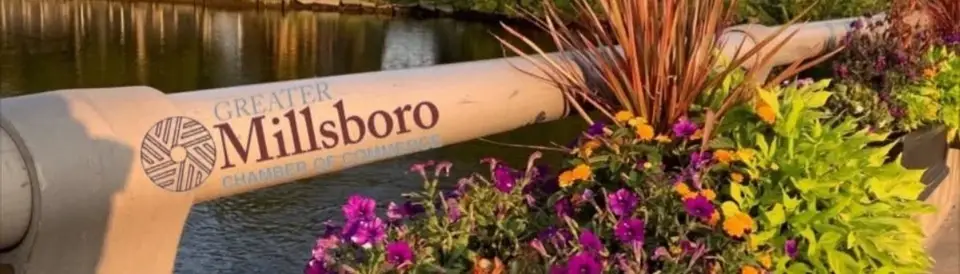 Greater Millsboro Chamber bridge sign and flowers