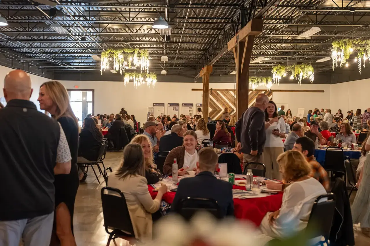 Attendees gathered at round tables during the Crawford County Chamber of Commerce Annual Meeting and Awards Dinner at The Hub in Crestline