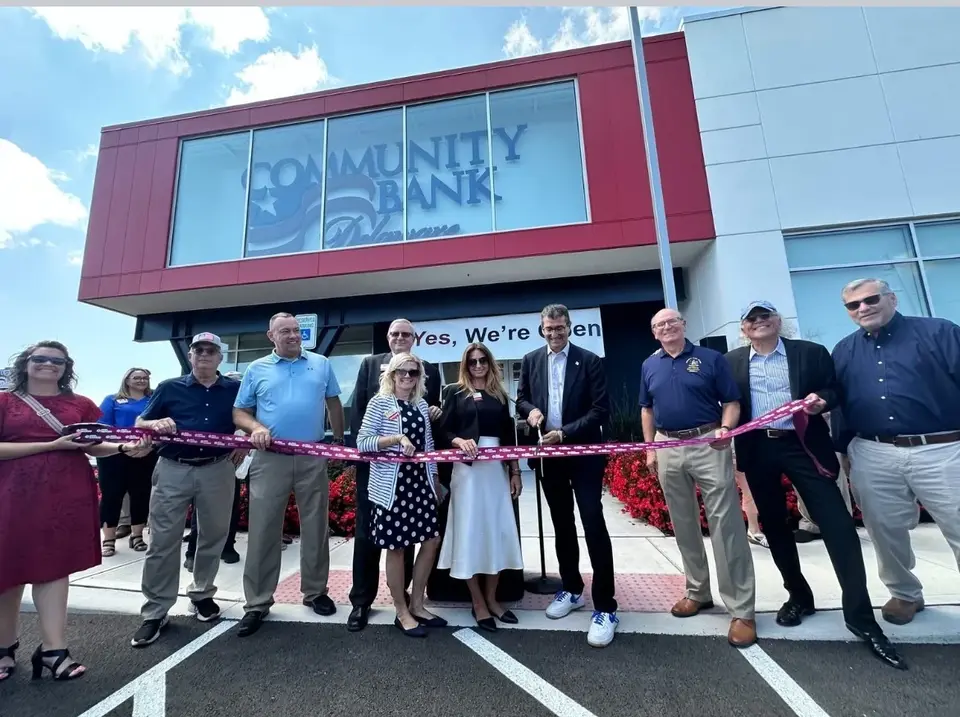 Greater Millsboro Chamber ribbon cutting outside Community Bank