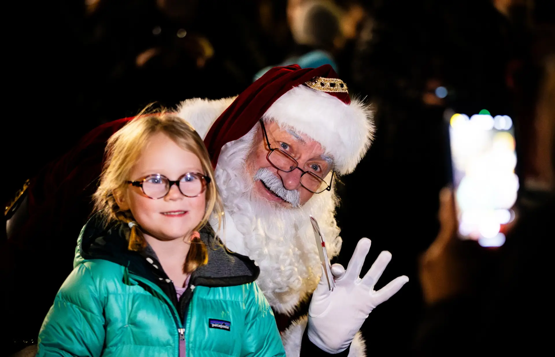 child smiling with santa