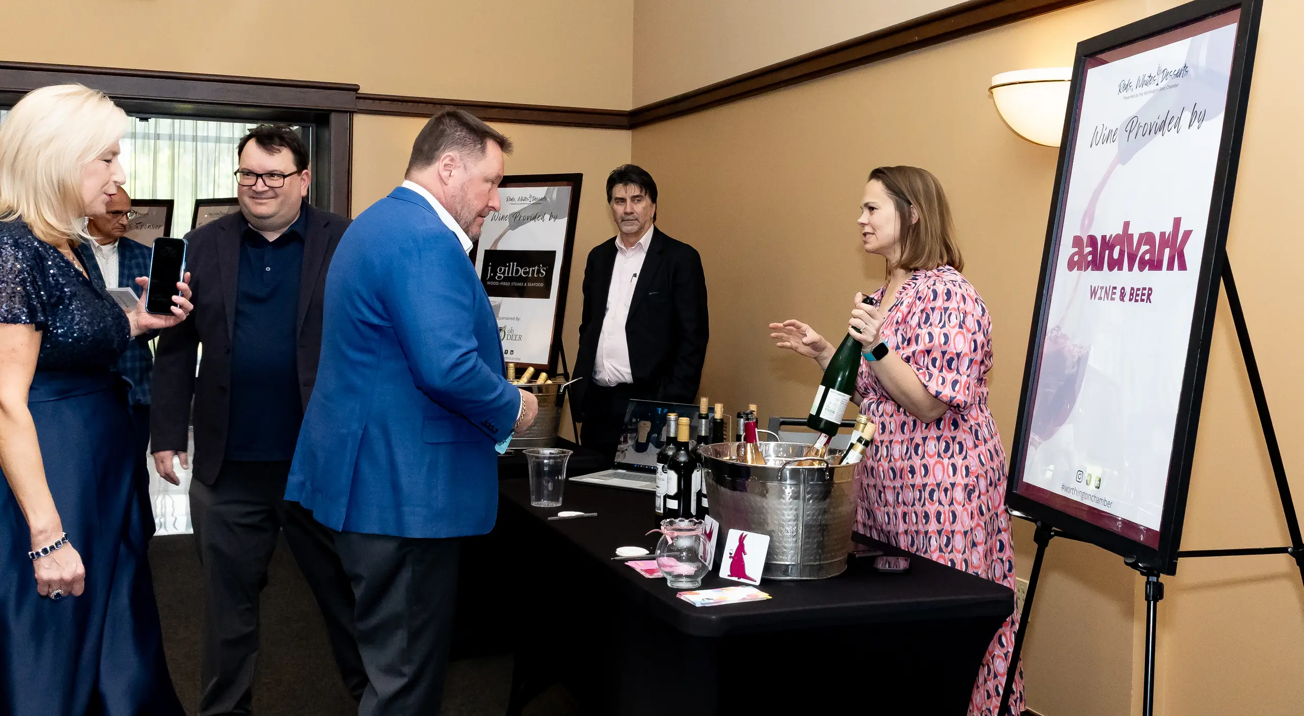 Linworth Connect participants talking with a local business exhibitor