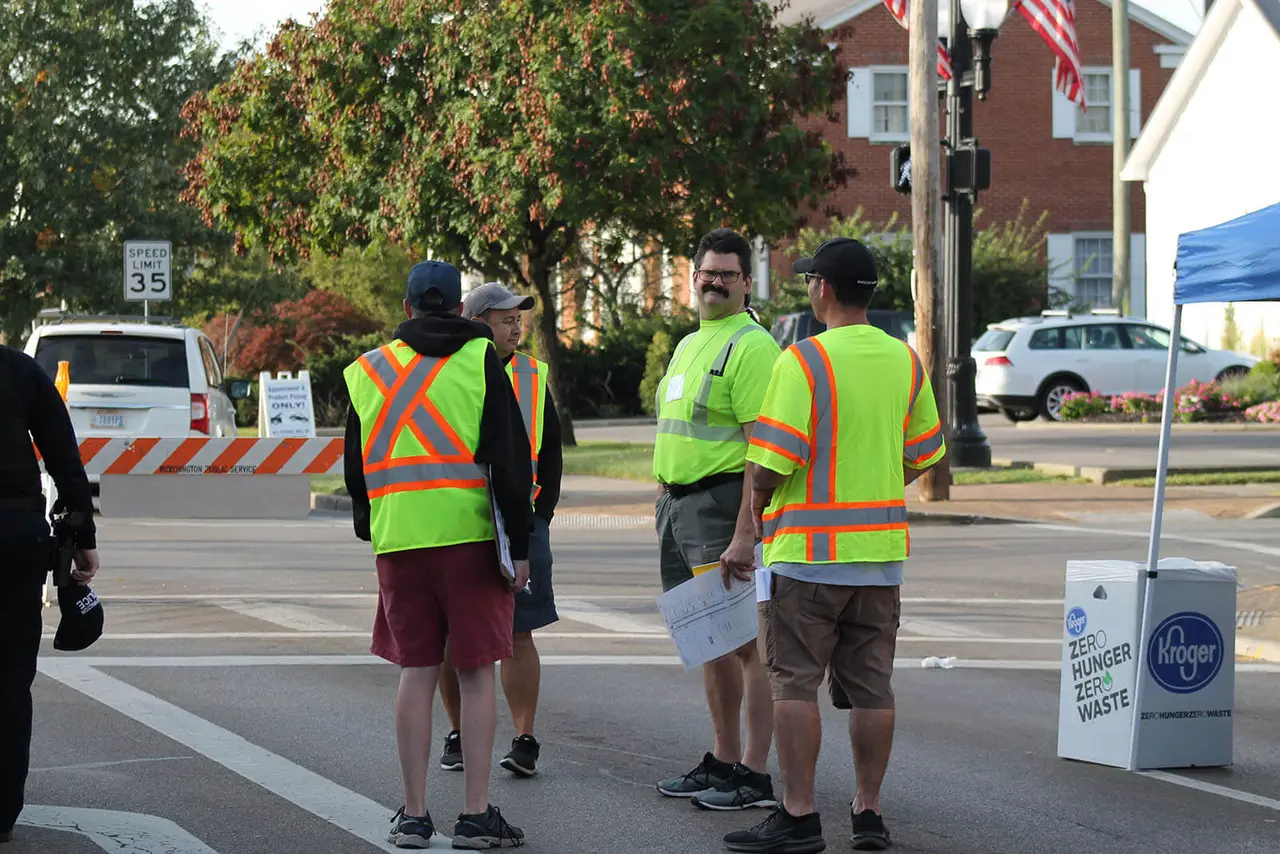 Hi-vis volunteers directing the High Street closure on Market Day morning