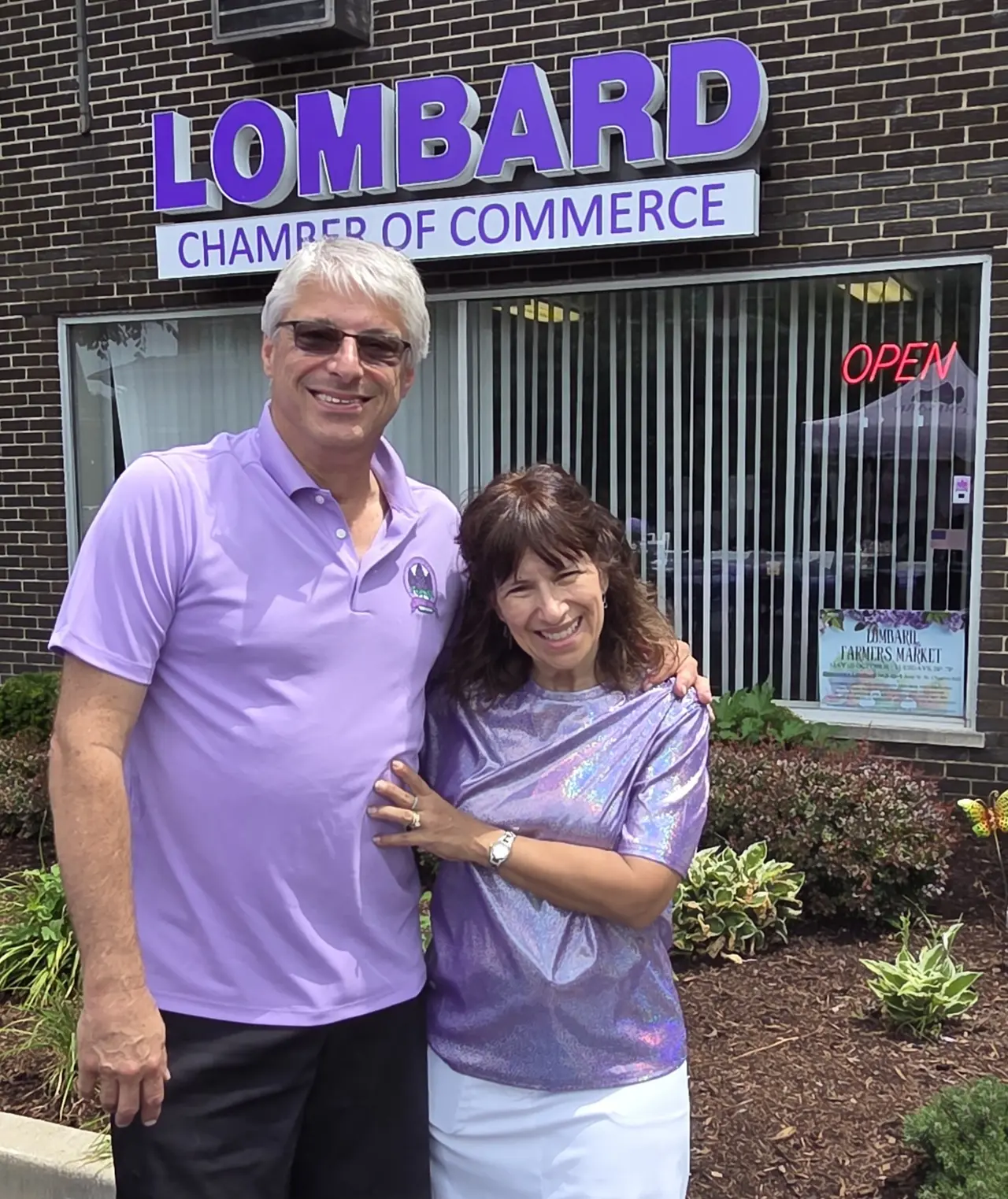 Two Chamber representatives outside the Lombard Chamber office