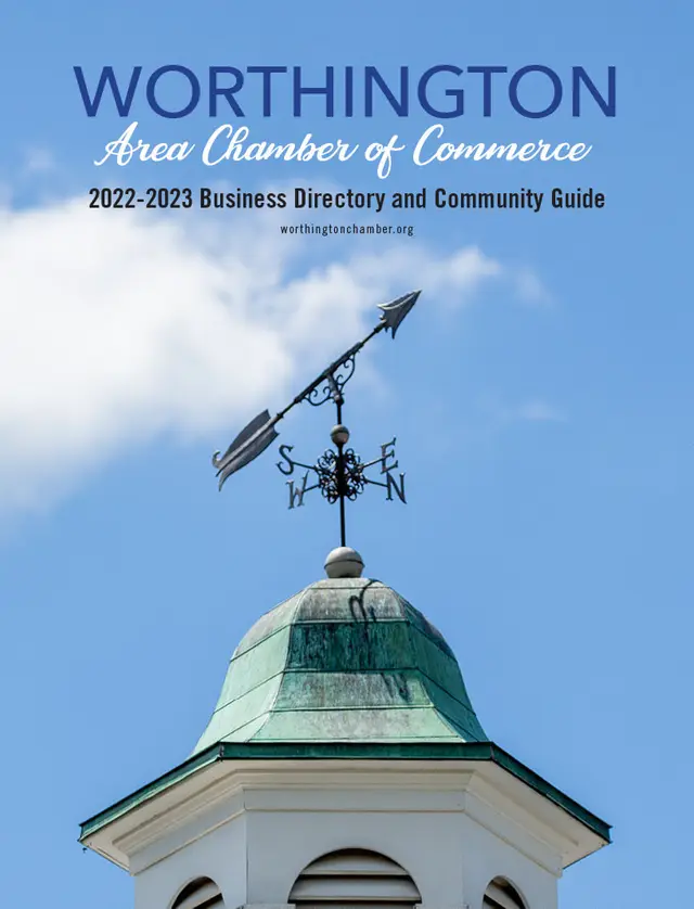 Cover of the chamber’s print Business Directory and Community Guide, a weathervane cupola against blue sky