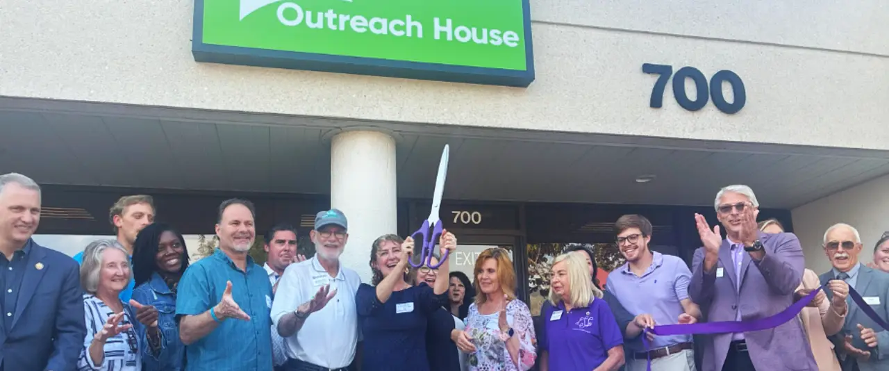 Lombard Area Chamber members celebrating an Outreach House ribbon cutting