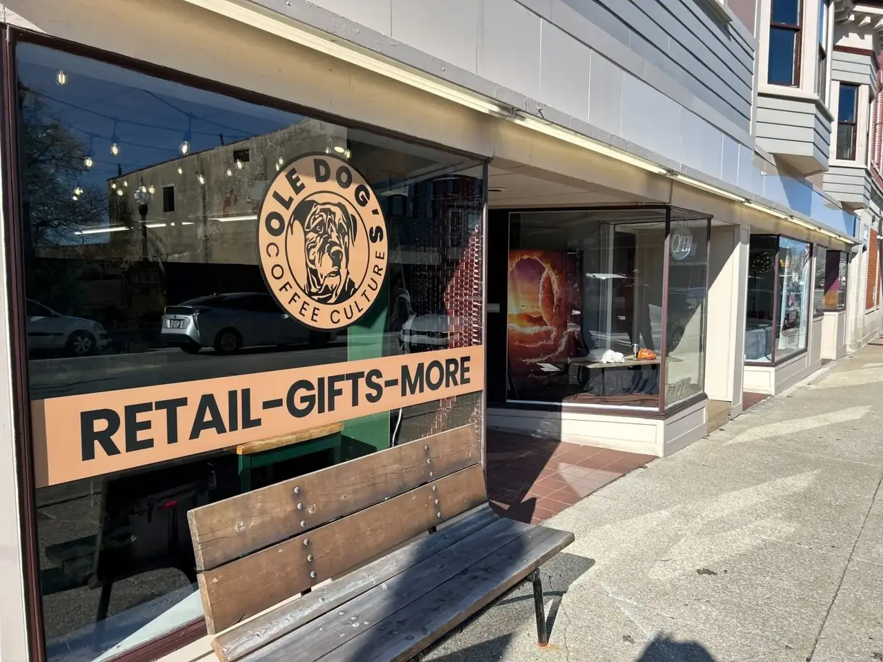 Storefront of Ole Dog’s Coffee Culture in Uptowne Galion with window signage reading "Retail – Gifts – More"