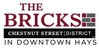 The Bricks in Downtown Hays logo