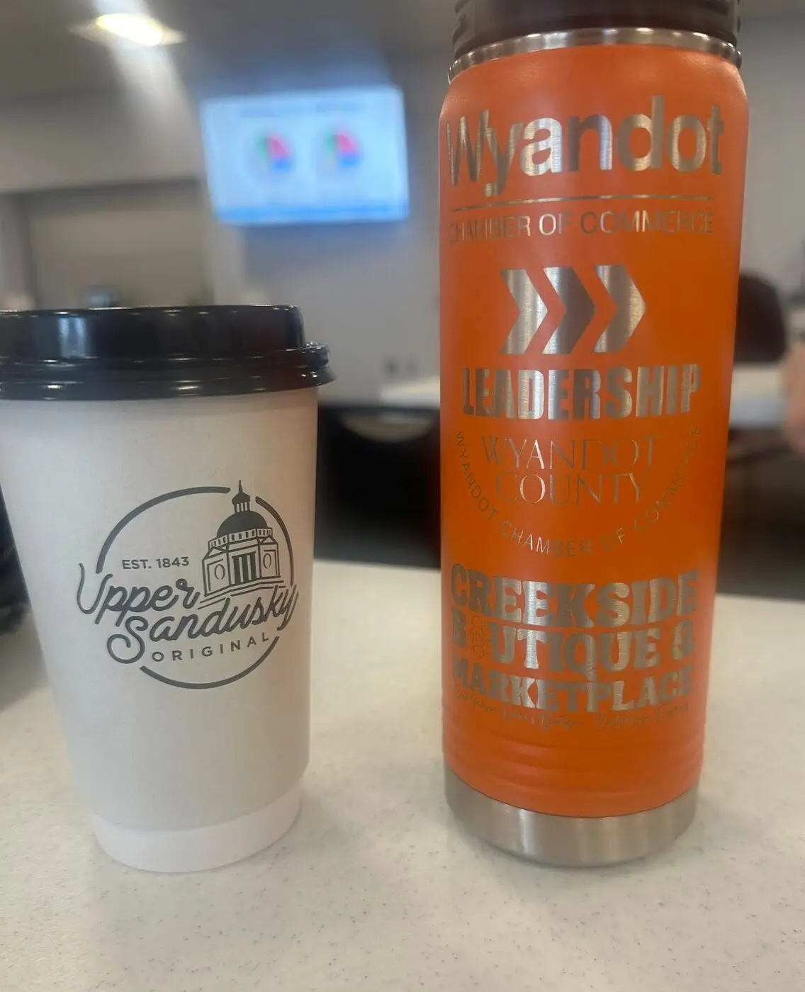 Leadership Wyandot program materials with local coffee and tumbler