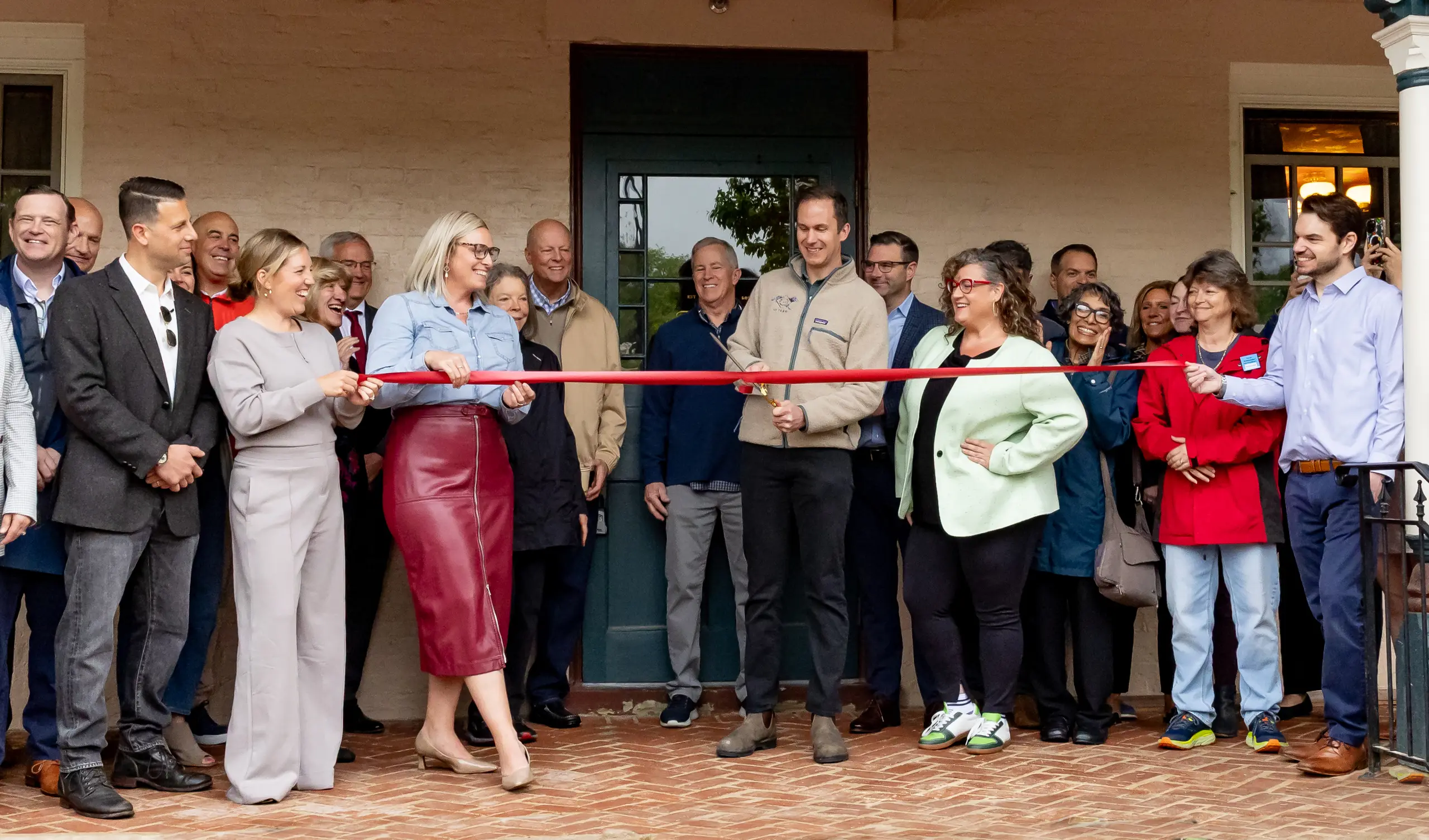 Worthington Chamber members and guests celebrating a ribbon cutting