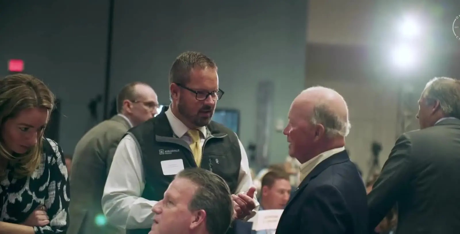 OneZone members networking at a chamber event