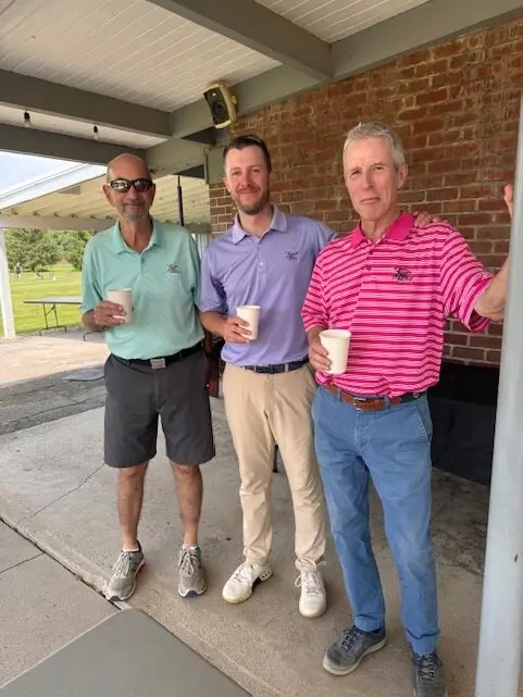 Golf Scramble participants at the clubhouse